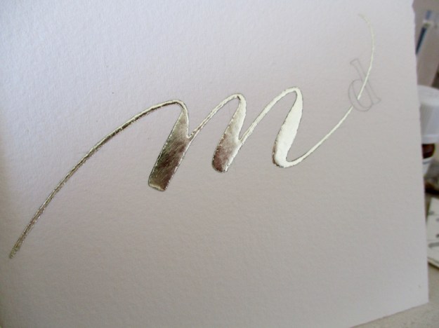 gilded-letter-m-gold-leaf-on-miniatum-uk