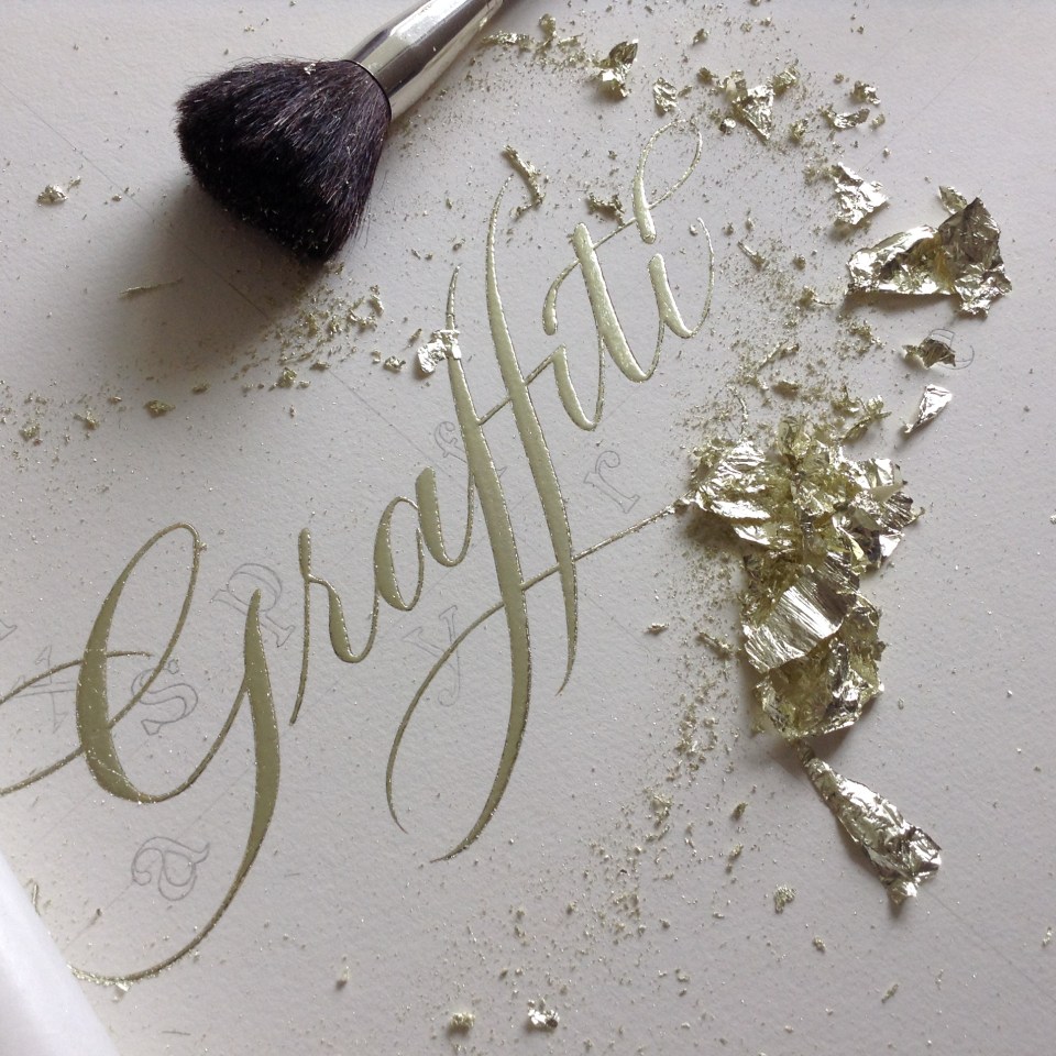 calligraphy-and-gold-leaf-graffiti-word-work-in-progress