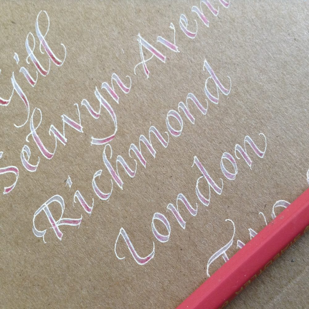 scroll-nib-italic-addressed-envelope