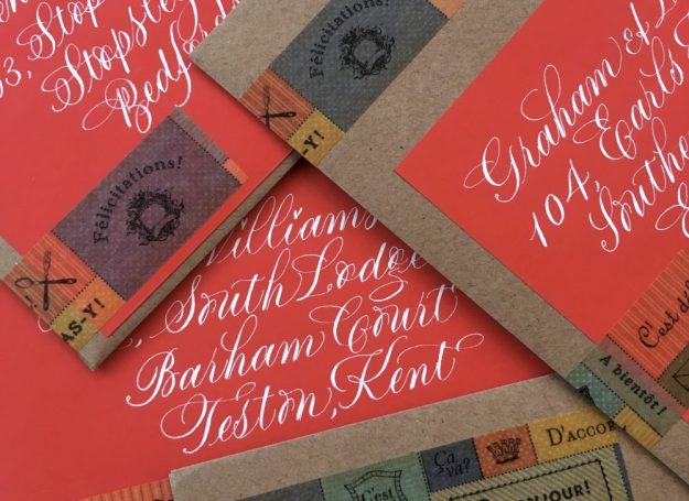 white-calligraphy-on-red-envelope-labels-uk