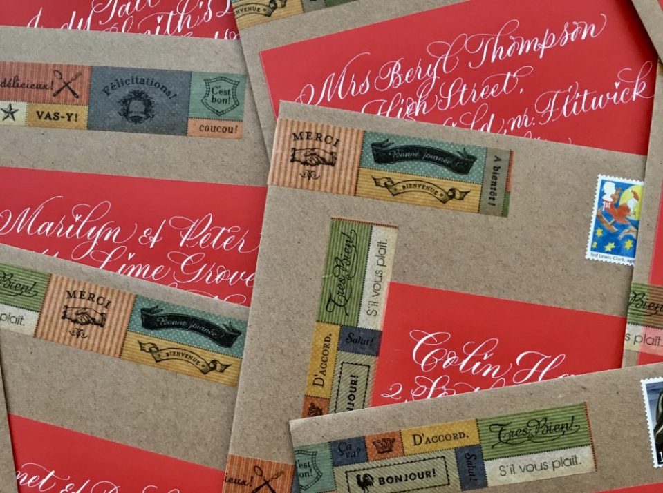 red-christmas-envelope-labels-on-manilla-with-washi-tape-uk