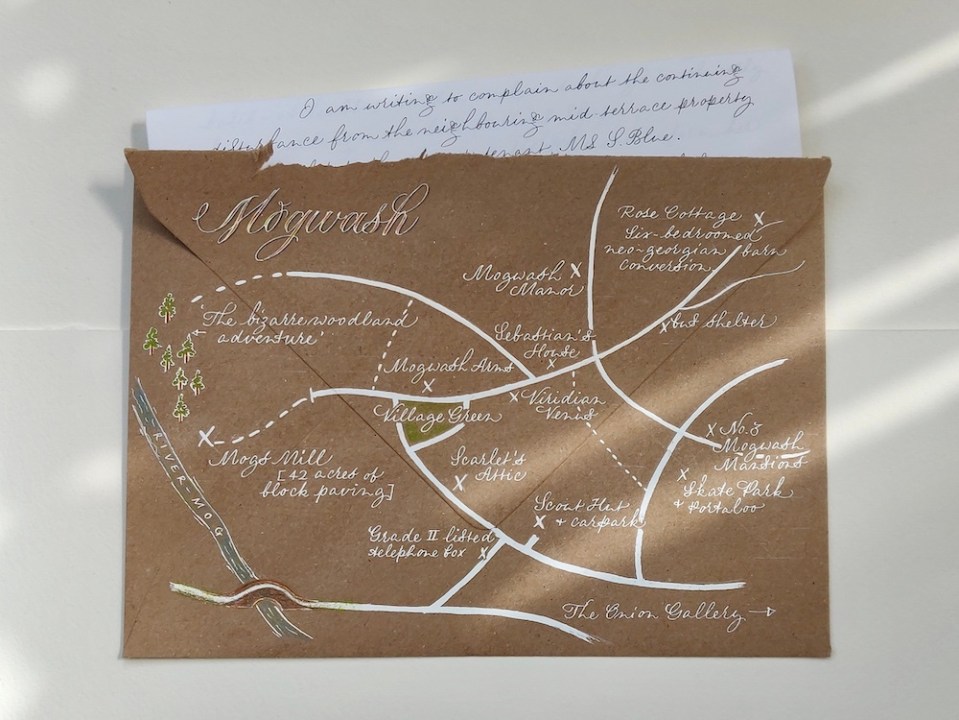 map-on-back-of-envelope-in-cursive-calligraphy
